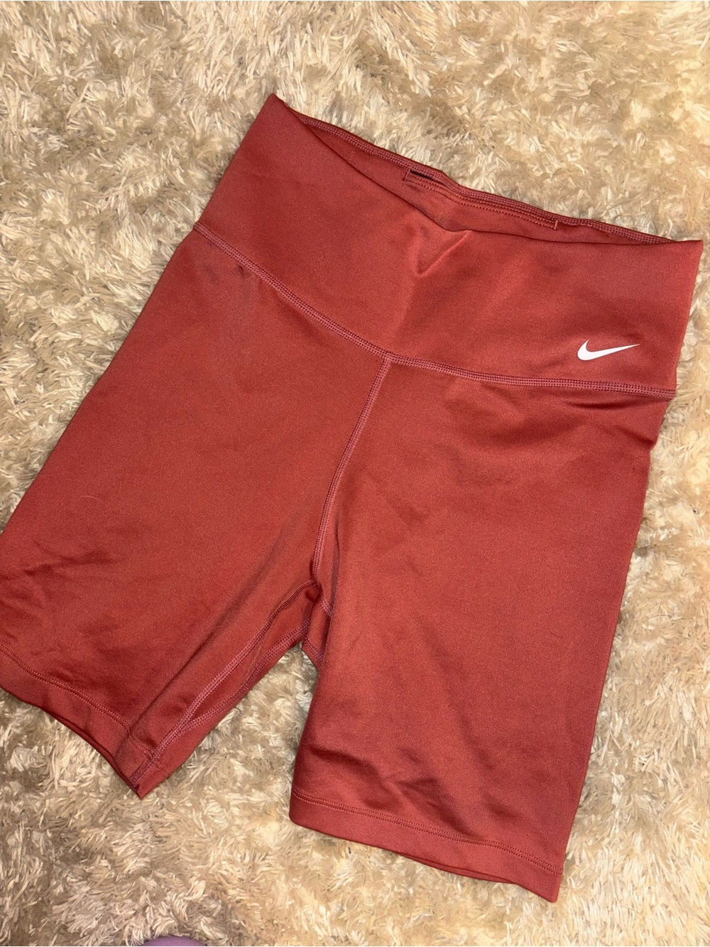 Nike High-Rise Bike Shorts in Rust Red 7 inch